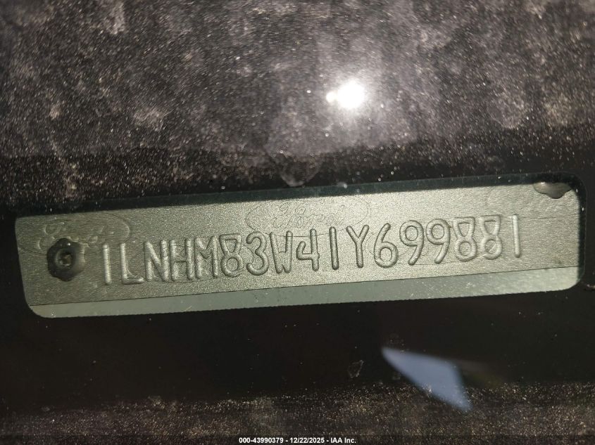 2001 Lincoln Town Car Cartier VIN: 1LNHM83W41Y699881 Lot: 43990379