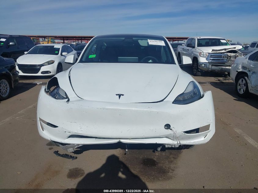 2023 Tesla Model Y Awd/Long Range Dual Motor All-Wheel Drive VIN: 7SAYGDEE4PA134810 Lot: 43990389