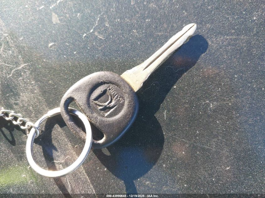 2000 Saturn Sl1 VIN: 1G8ZH5284YZ233395 Lot: 43990648