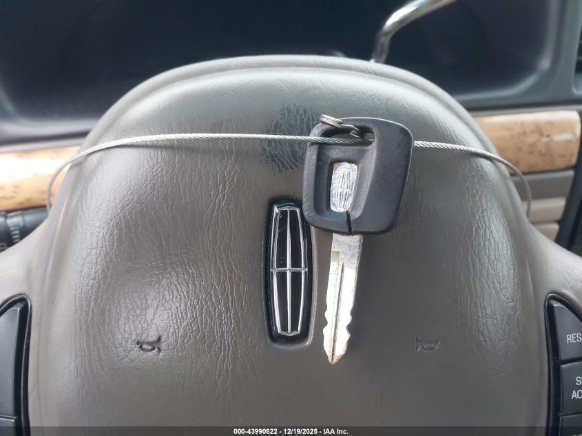 2002 Lincoln Continental VIN: 1LNHM97V12Y614570 Lot: 43990822