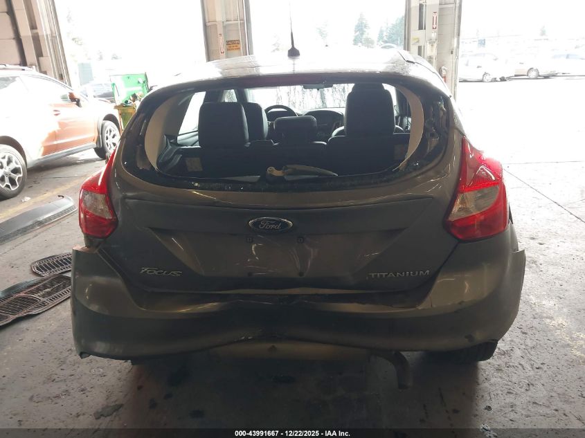 2014 Ford Focus Titanium VIN: 1FADP3N23EL317257 Lot: 43991667
