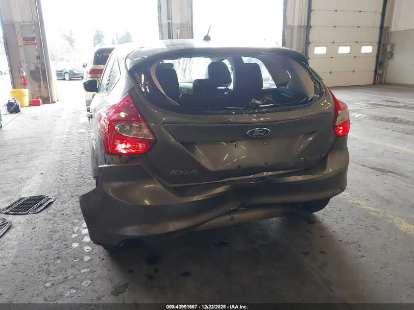 2014 Ford Focus Titanium VIN: 1FADP3N23EL317257 Lot: 43991667