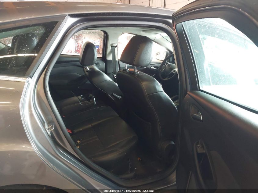 2014 Ford Focus Titanium VIN: 1FADP3N23EL317257 Lot: 43991667