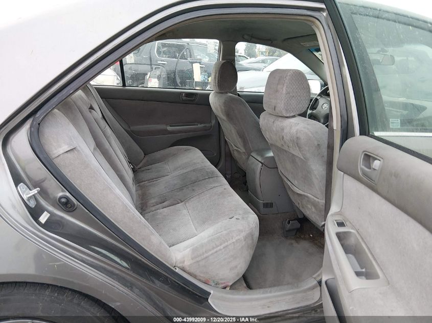 2002 Toyota Camry Le VIN: JTDBE32K520097841 Lot: 43992009