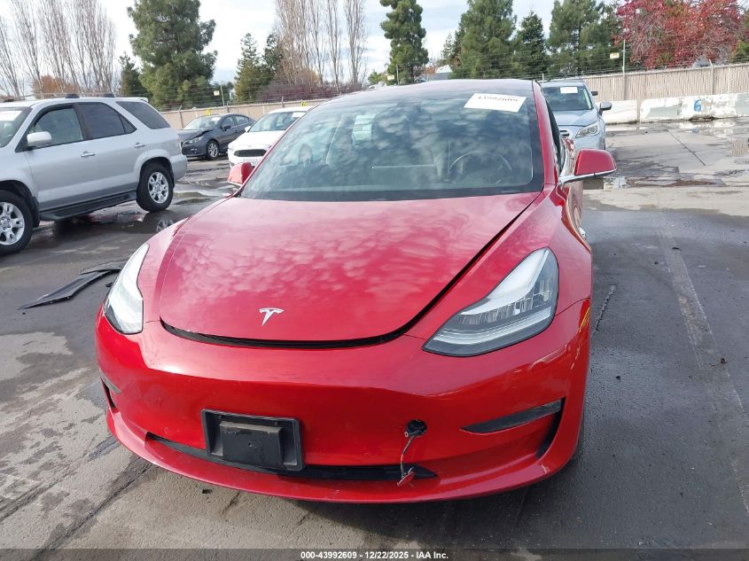 2018 Tesla Model 3 Long Range/Mid Range VIN: 5YJ3E1EA4JF030711 Lot: 43992609