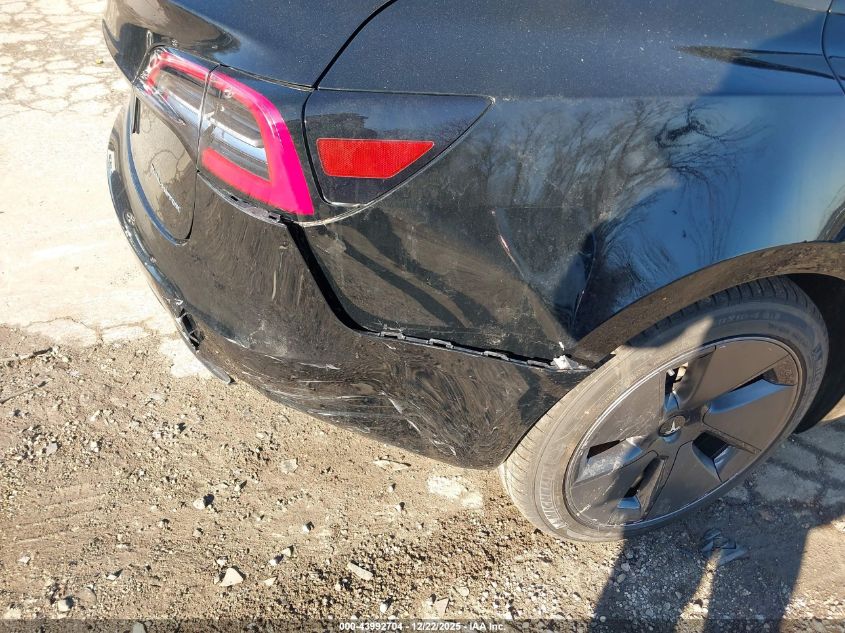 2023 Tesla Model 3 Long Range Dual Motor All-Wheel Drive VIN: 5YJ3E1EB9PF386878 Lot: 43992704