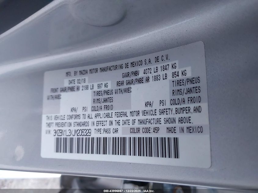 2018 Mazda Mazda3 Touring VIN: 3MZBN1L3XJM206329 Lot: 43996867