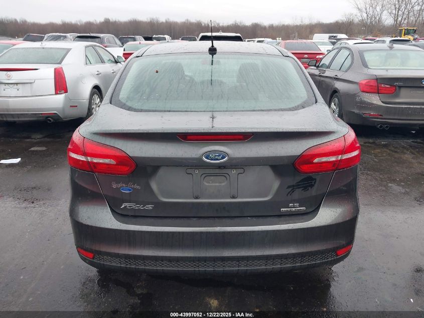 2015 Ford Focus Se VIN: 1FADP3F2XFL217317 Lot: 43997052
