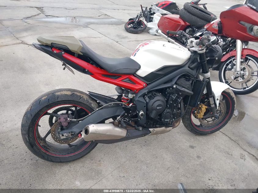 2013 Triumph Motorcycle Street Triple R VIN: SMTL03NE8DT575729 Lot: 43998678