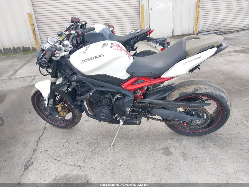 2013 Triumph Motorcycle Street Triple R VIN: SMTL03NE8DT575729 Lot: 43998678