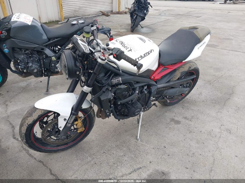 2013 Triumph Motorcycle Street Triple R VIN: SMTL03NE8DT575729 Lot: 43998678