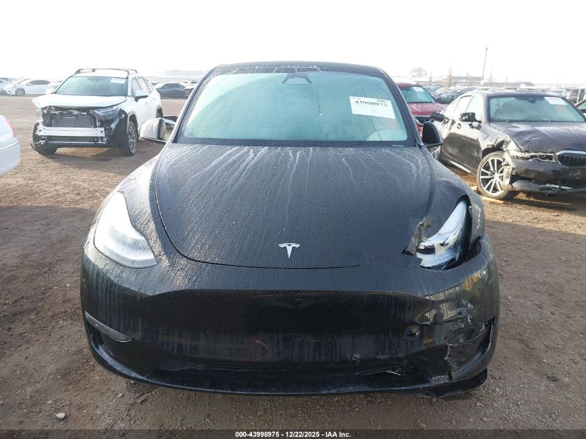 2023 Tesla Model Y Awd/Long Range Dual Motor All-Wheel Drive VIN: 7SAYGDEE2PA142811 Lot: 43998975