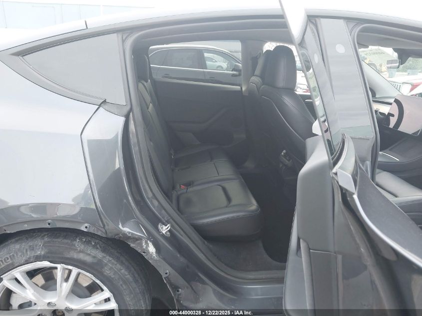 2023 Tesla Model Y Awd/Long Range Dual Motor All-Wheel Drive VIN: 7SAYGDEE5PF839134 Lot: 44000328
