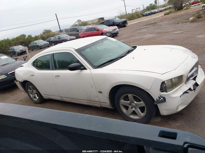 2009 Dodge Charger Sxt VIN: 2B3LA33V29H638067 Lot: 44001777
