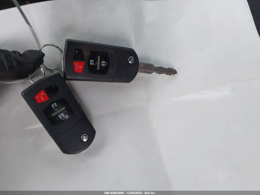 2010 Mazda Mazda3 I Touring VIN: JM1BL1SG2A1140448 Lot: 44002808