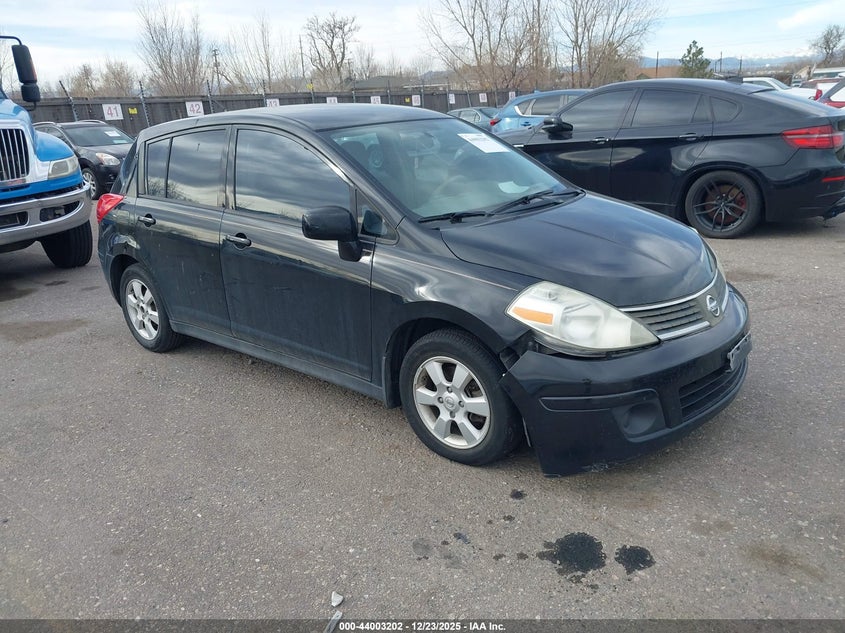 3N1BC13E09L394034 2009 Nissan Versa 1.8Sl auction photo 1