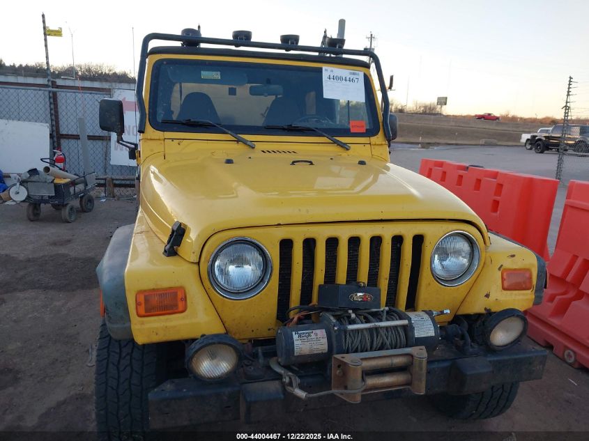 2000 Jeep Wrangler Sport VIN: 1J4FA49S0YP748215 Lot: 44004467