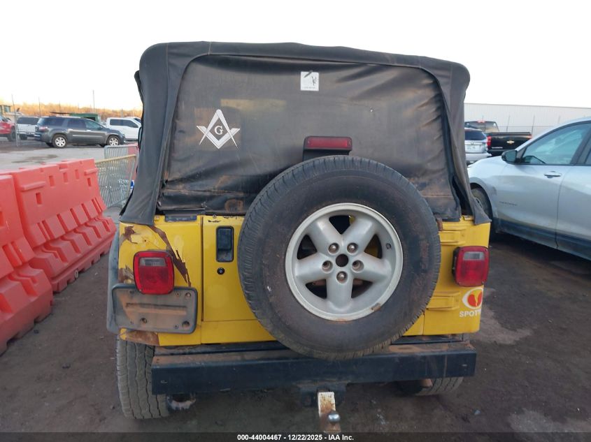 2000 Jeep Wrangler Sport VIN: 1J4FA49S0YP748215 Lot: 44004467