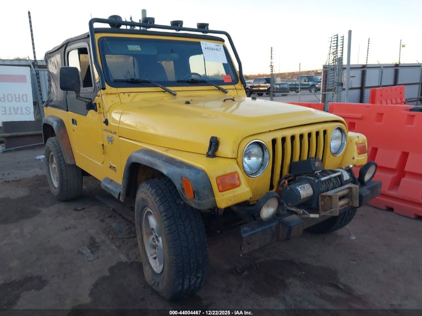 2000 Jeep Wrangler Sport VIN: 1J4FA49S0YP748215 Lot: 44004467