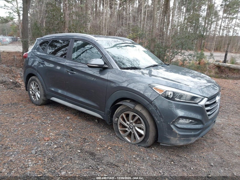 KM8J3CA43HU408894 2017 Hyundai Tucson Se Plus auction photo 1