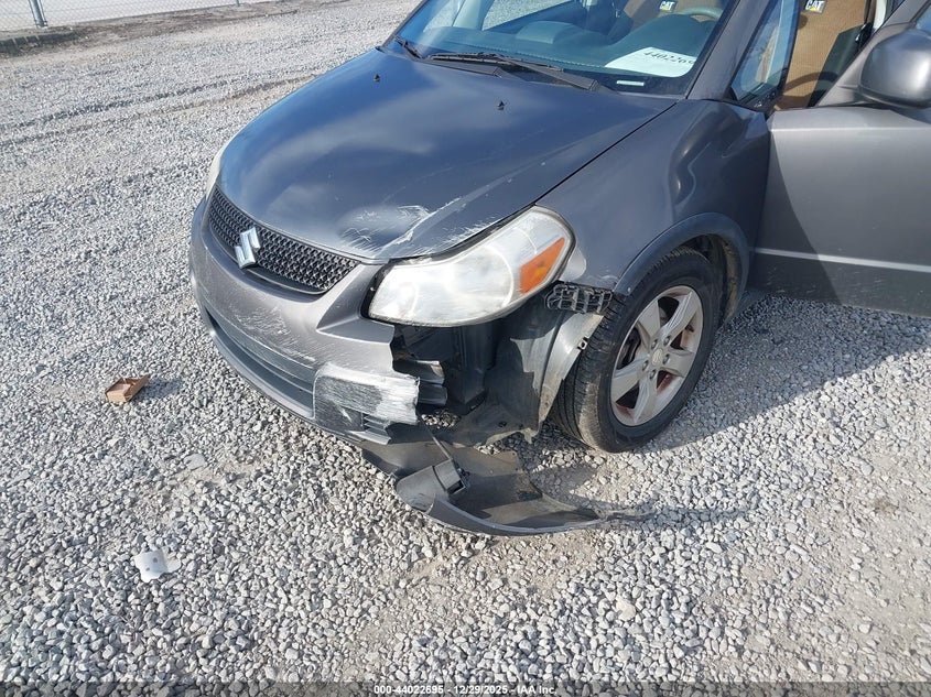 2012 Suzuki Sx4 Premium/Tech Valu Pkg (Nav) VIN: JS2YB5A30C6302897 Lot: 44022695