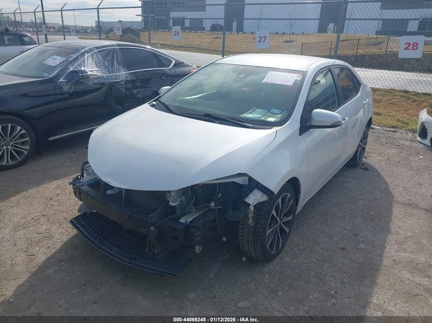 VIN 5YFBURHEXHP669010 2017 TOYOTA COROLLA SE