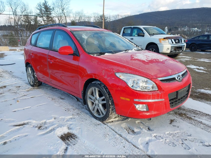 KMHDC8AE5AU052571 2010 Hyundai Elantra Touring Se auction photo 1
