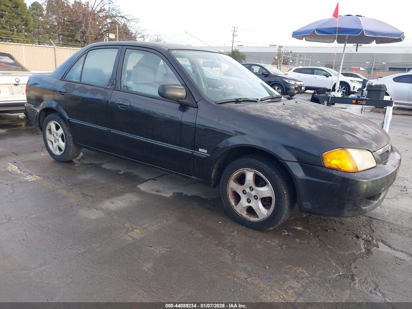 MAZDA PROTEGE 1999. Lot# 44089234. VIN JM1BJ2215X0138912. Photo 1