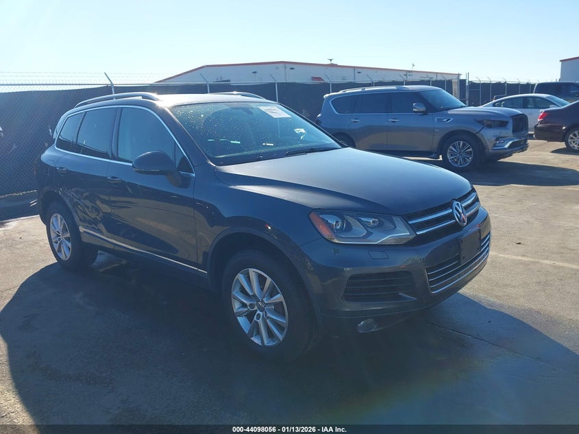 VOLKSWAGEN TOUAREG 2013. Lot# 44098056. VIN WVGEP9BP5DD011750. Photo 1
