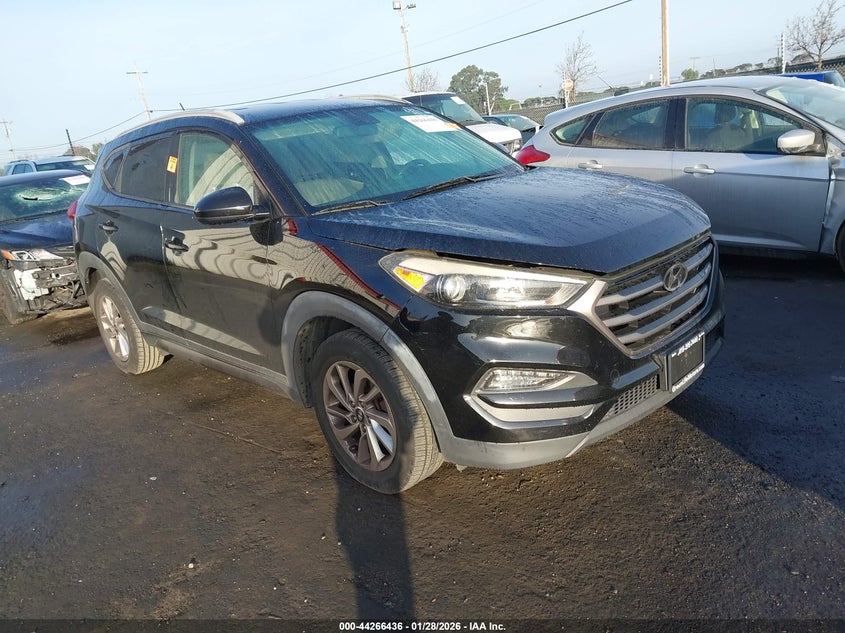 KM8J33A45GU138887 2016 Hyundai Tucson Se auction photo 1