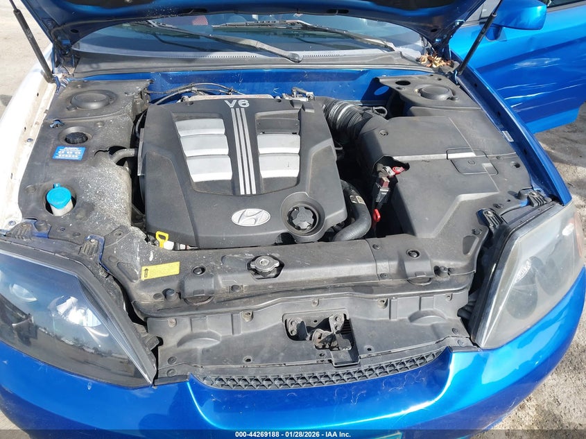 2005 Hyundai Tiburon Gt/Se VIN: KMHHN65F75U167469 Lot: 44269188