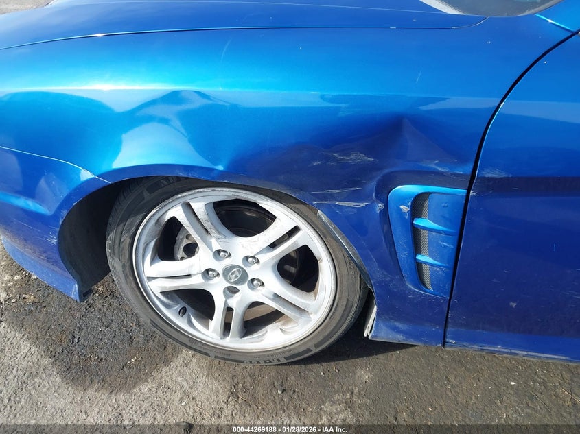 2005 Hyundai Tiburon Gt/Se VIN: KMHHN65F75U167469 Lot: 44269188