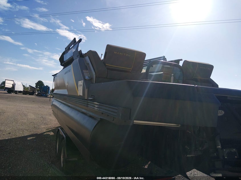 2024 MANITOU PONTOON AND TRAILER auction photo 3