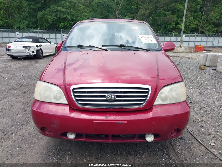 2002 Kia Sedona Ex/Lx VIN: KNDUP131426210897 Lot: 44349434