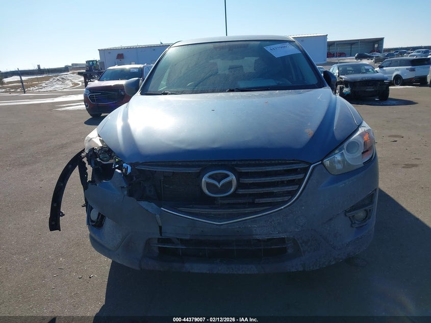 2016 Mazda Cx-5 Grand Touring VIN: JM3KE4DY0G0799698 Lot: 44379007