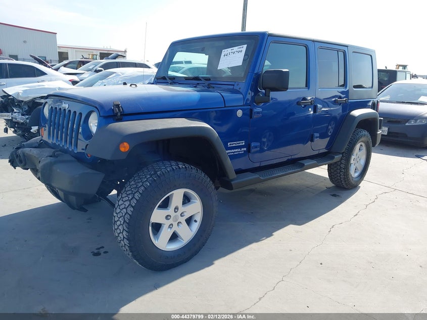 2010 Jeep Wrangler Unlimited Sport 1J4BA3H19AL109703 photo 1