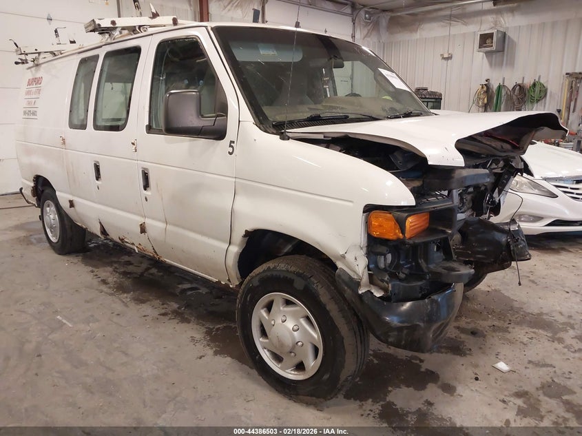 1FTNE1EW7CDA97432 FORD E-150 Photo 1
