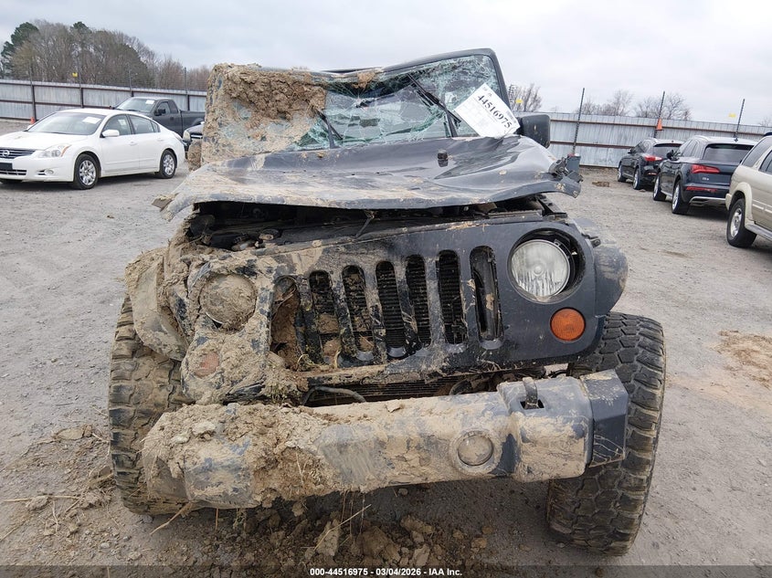 2012 Jeep Wrangler / 3.6 Sport black Lot 111044516975 Vin 1C4AJWAG7CL233408