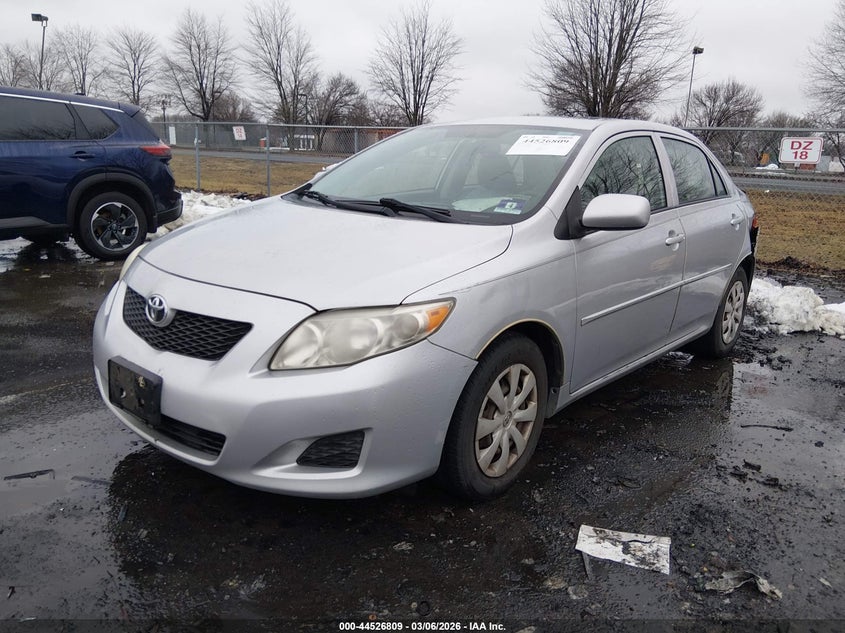 2009 Toyota Corolla Le 2T1BU40E69C147832 photo 1