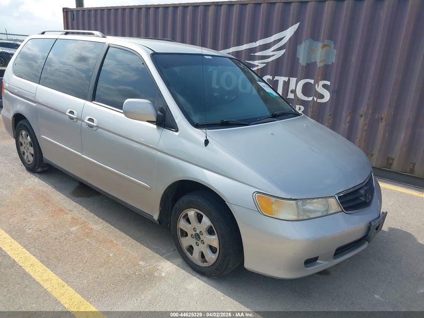 5FNRL18604B052779 2004 Honda Odyssey Ex auction photo 1
