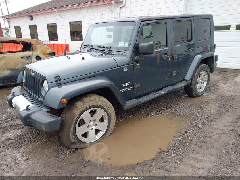 2008 Jeep Wrangler Unlimited Sahara 1J8GA59138L631817 photo 1