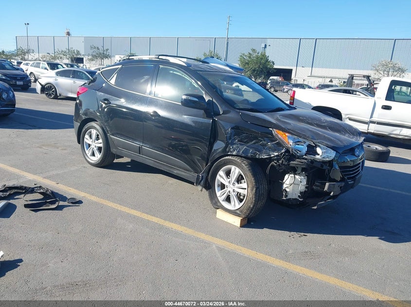 KMHJU3AC0CU507895 2012 Hyundai Tucson auction photo 1