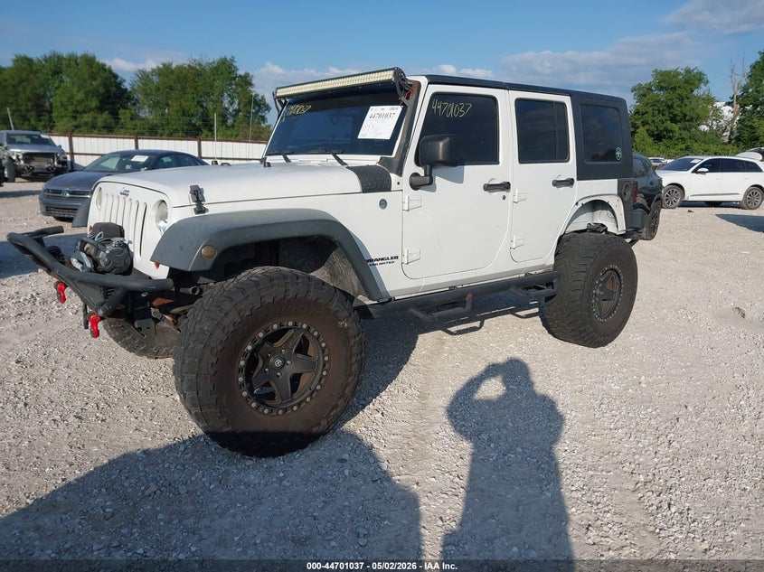 2012 Jeep Wrangler Unlimited Sport 1C4HJWDG7CL140799 photo 1