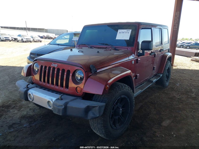 2008 Jeep Wrangler Unlimited Sahara 1J8GA59168L545515 photo 1