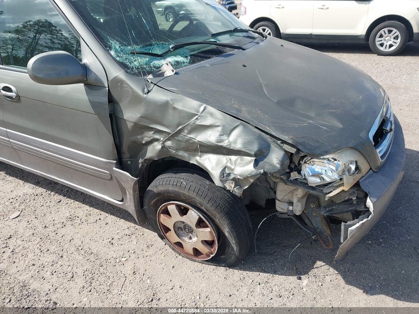 2003 Kia Sedona Ex/Lx VIN: KNDUP131036489282 Lot: 44720584