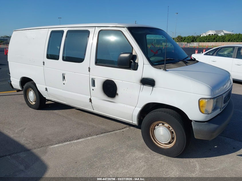 1FTRE14W01HA23018 FORD E-150 Photo 1