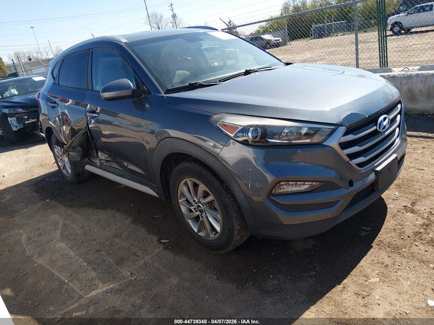 KM8J33A45HU462567 2017 Hyundai Tucson Se auction photo 1