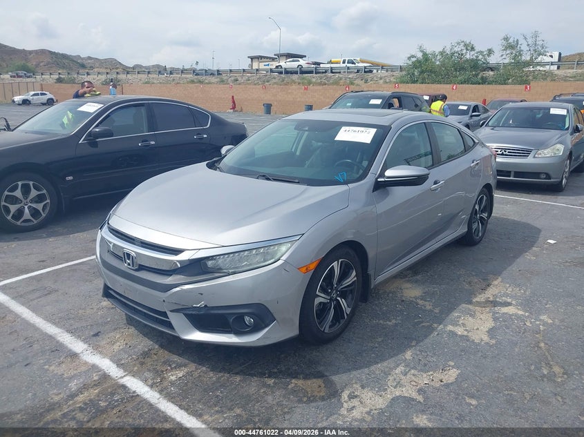 2016 Honda Civic Touring 2HGFC1F9XGH635134 photo 1
