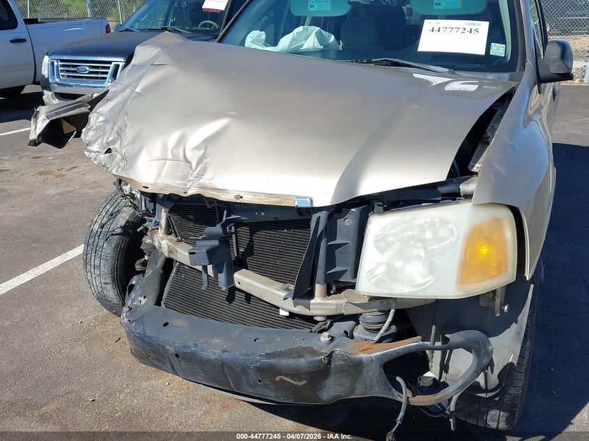 2006 GMC Envoy Sle VIN: 1GKDS13S762239240 Lot: 44777245