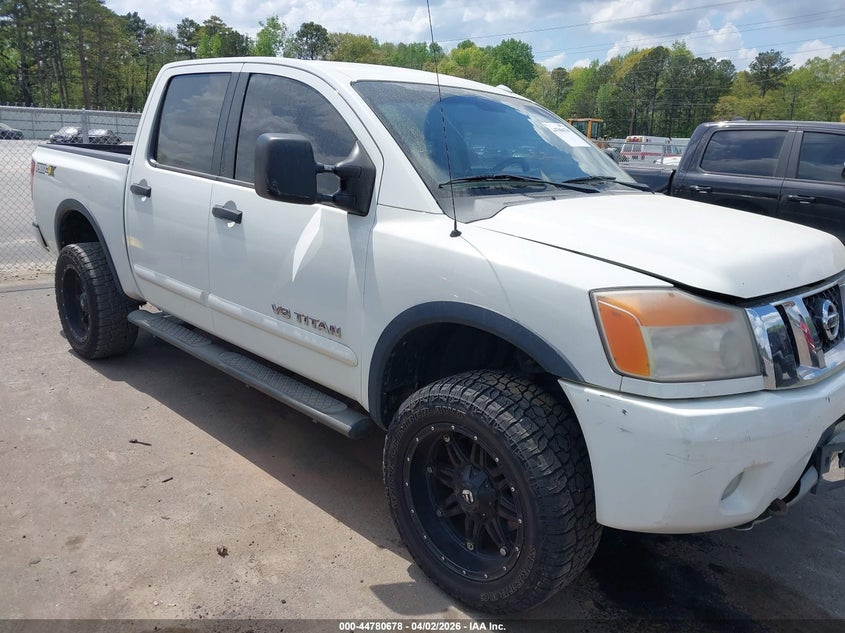 1N6BA0EC3EN509323 NISSAN TITAN Photo 1
